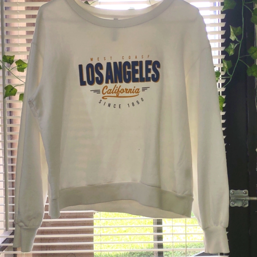 A white round neck hoodie size L